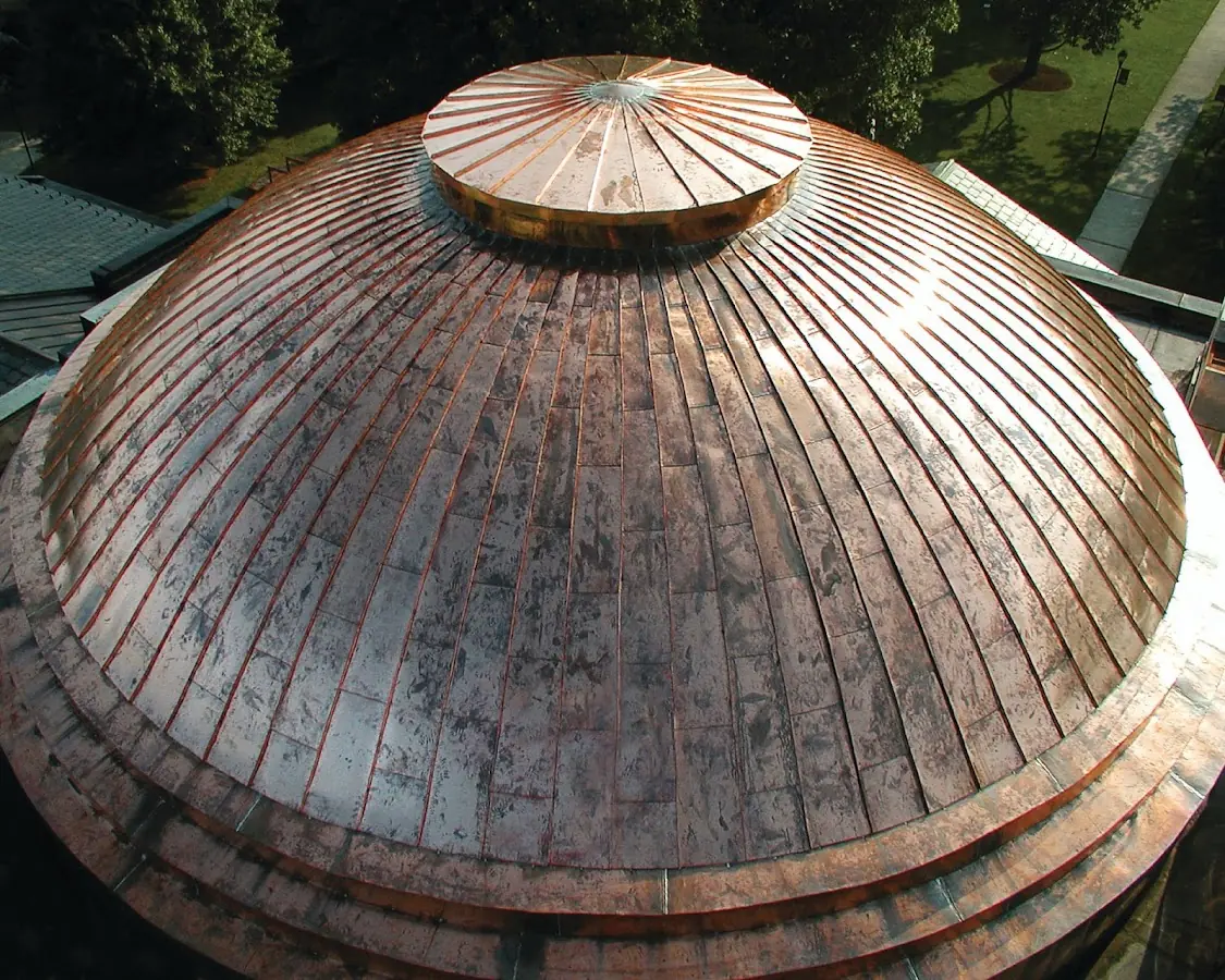 Craftsman Roofing crew installing a new roof in Mason